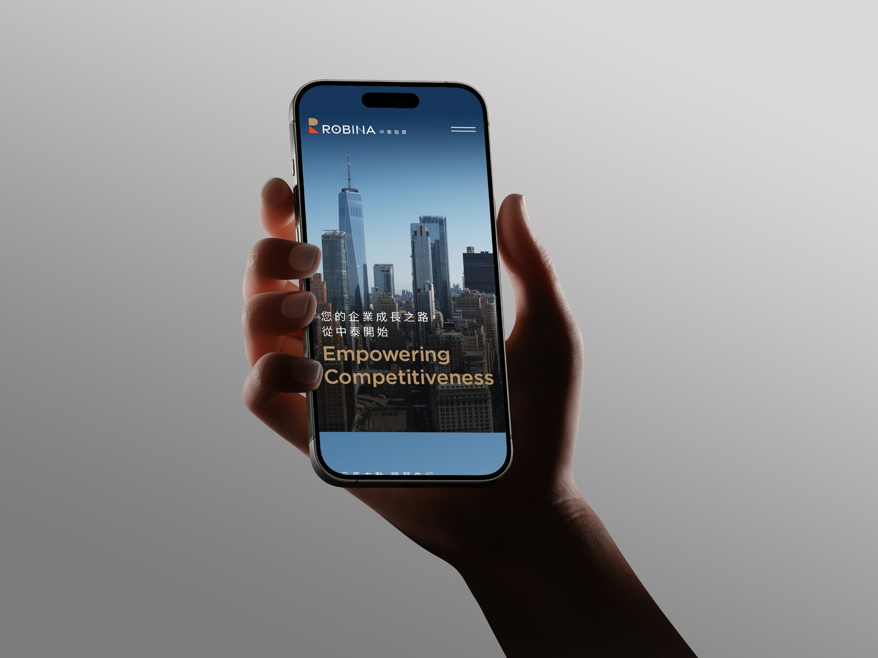 ROBINA website on a phone held in a hand