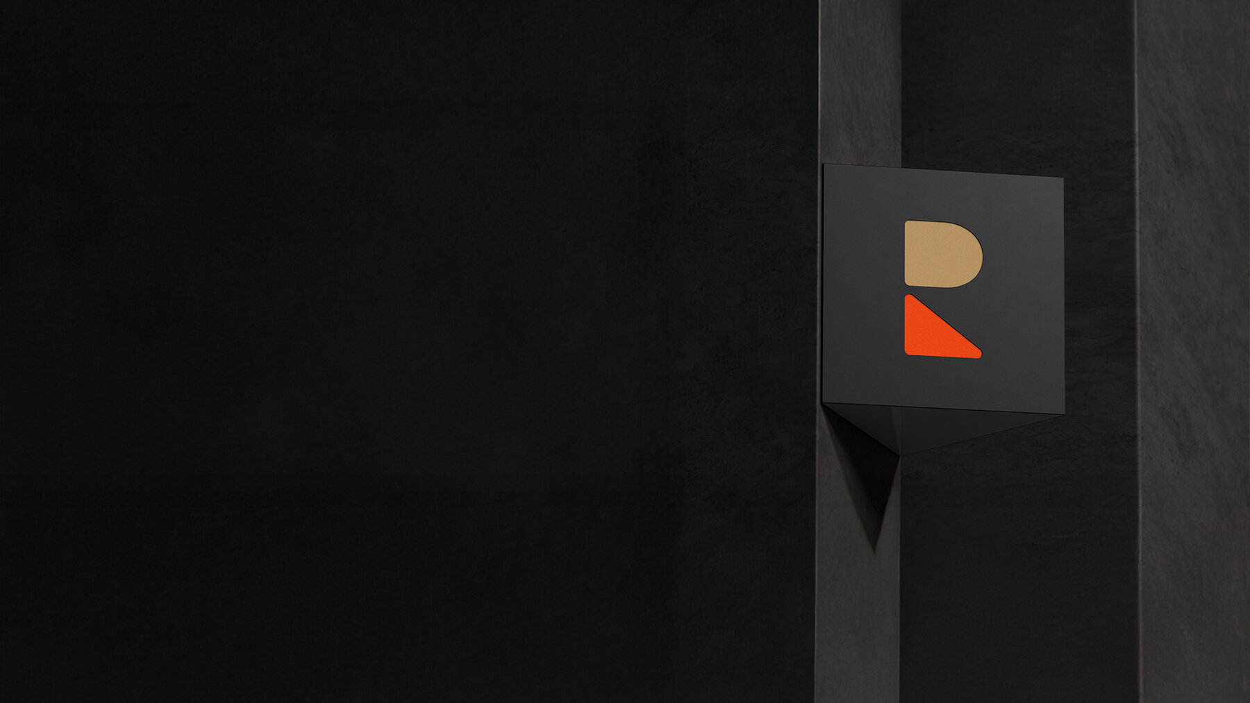 ROBINA logo on a dark wall sign