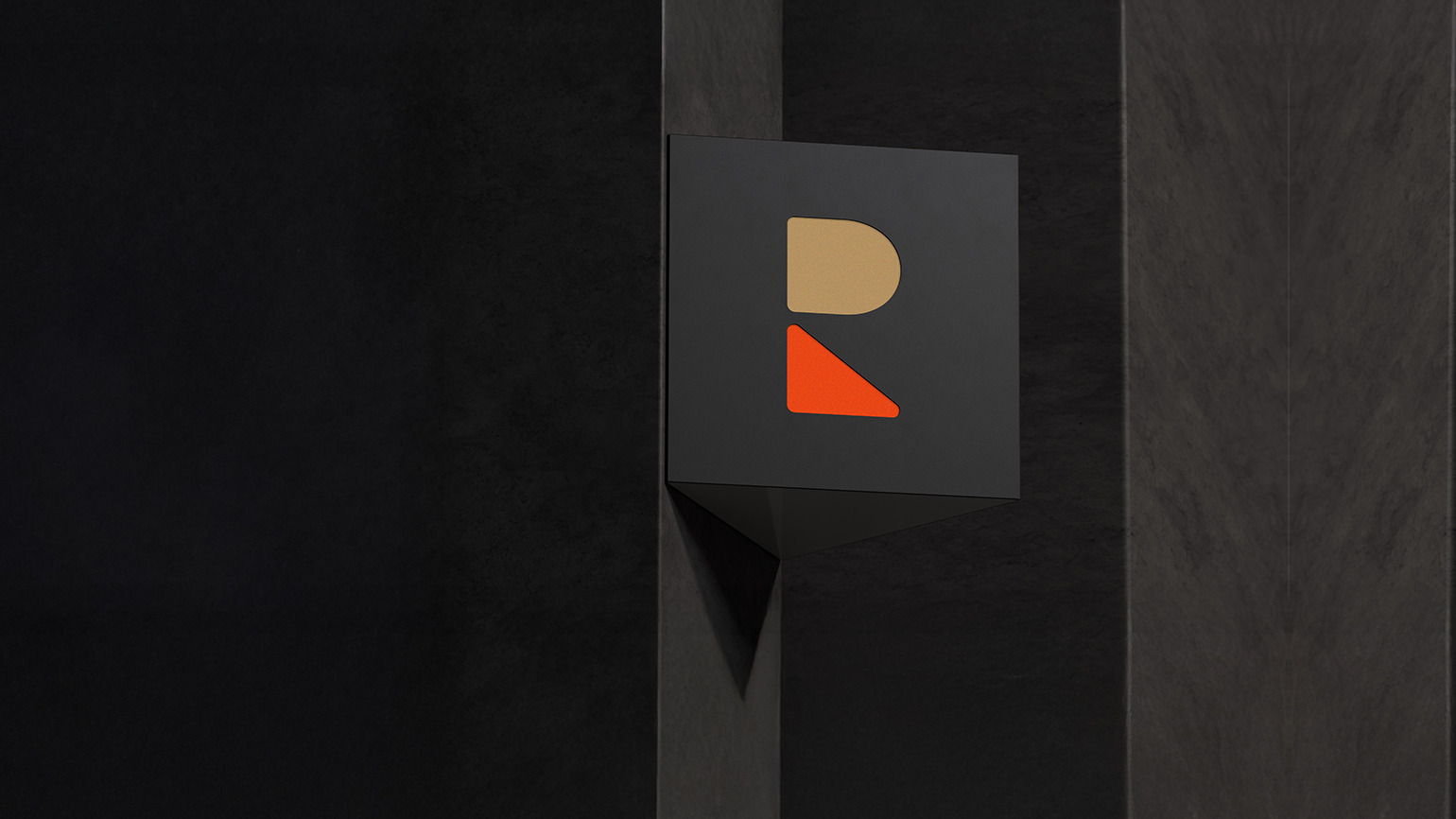 ROBINA logo on a dark wall sign
